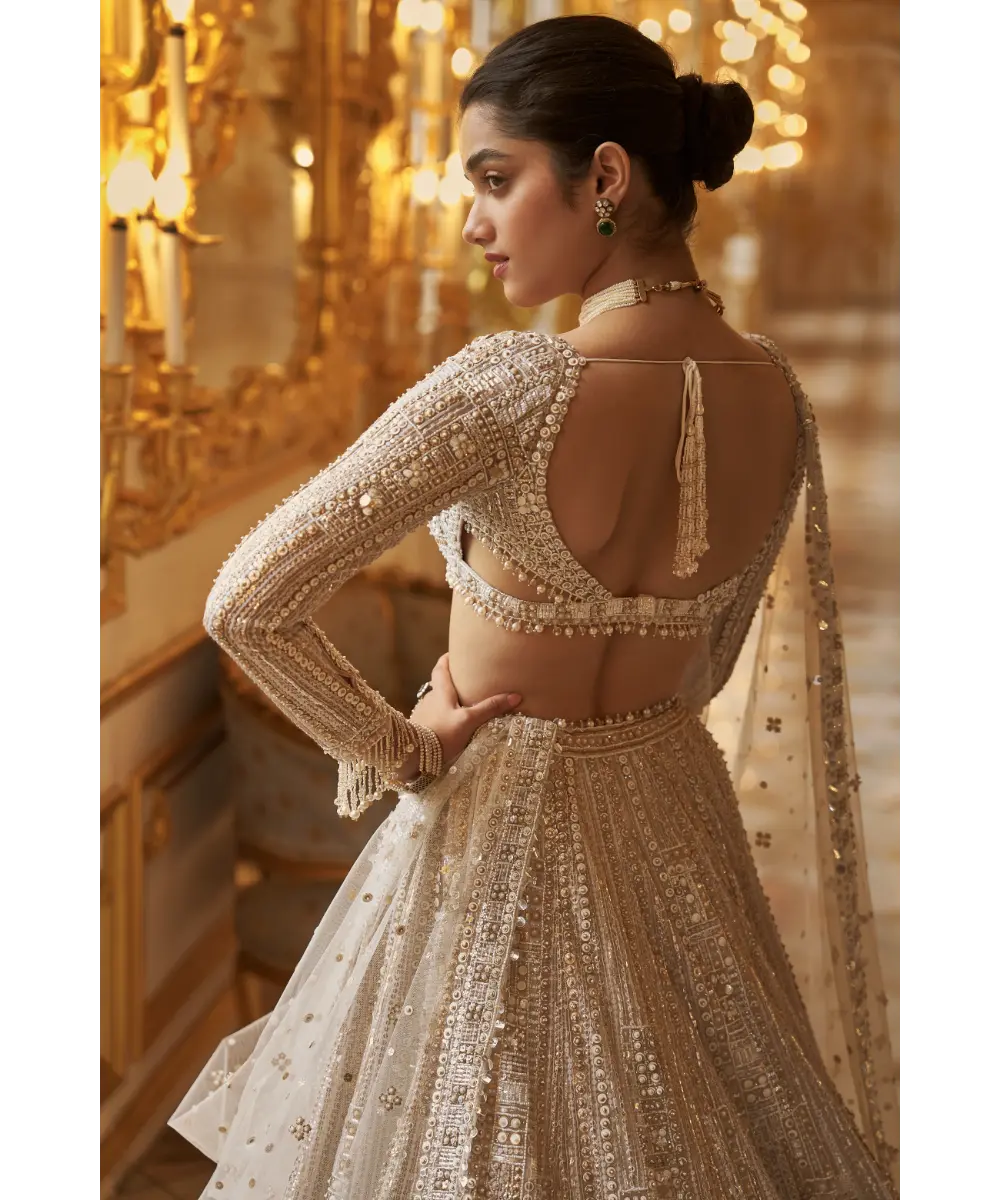 SEEMA GUJRAL- Ivory Gold Sequin Lehenga Set